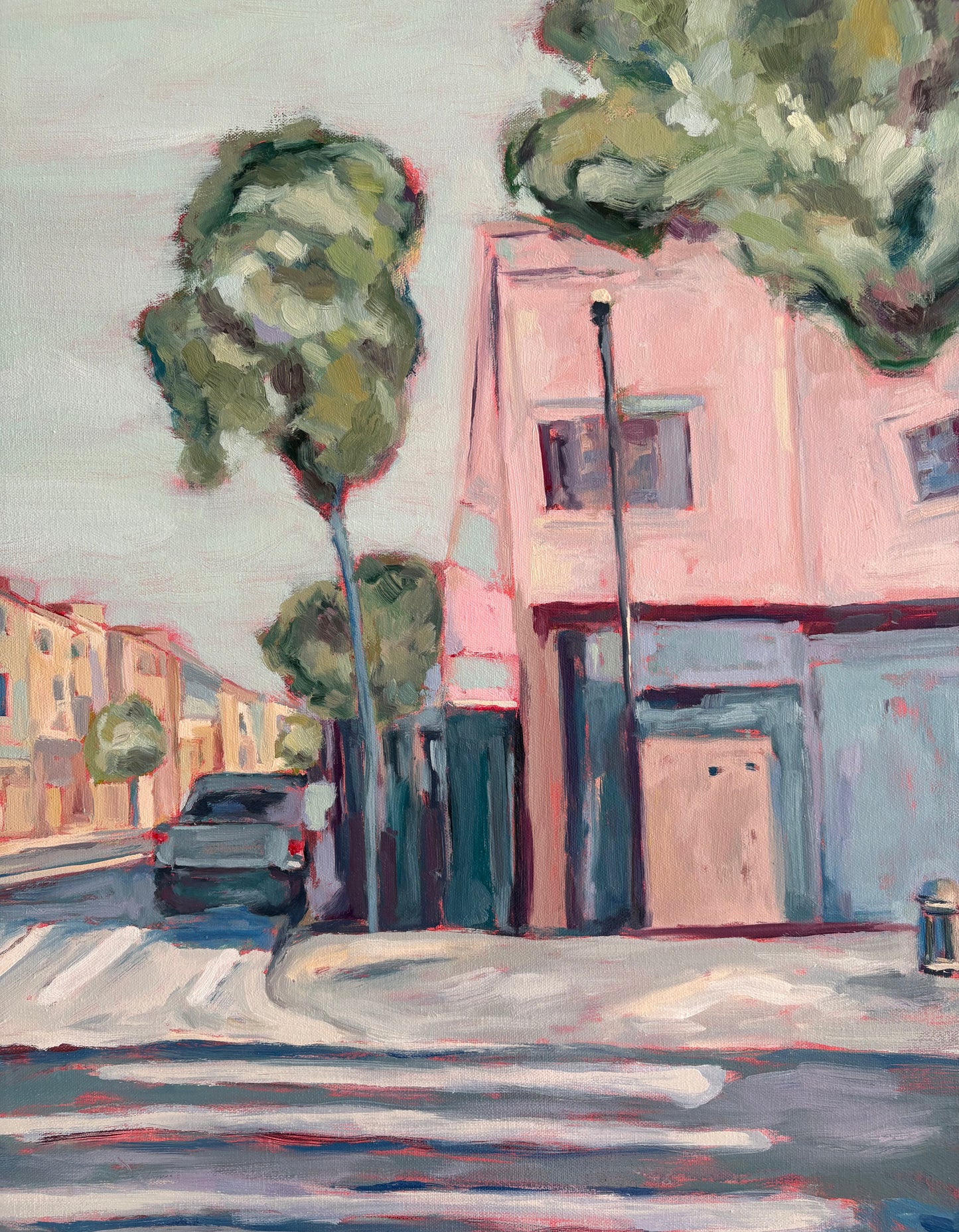 Close up of a painting of a street scene with buildings, trees, and a car.