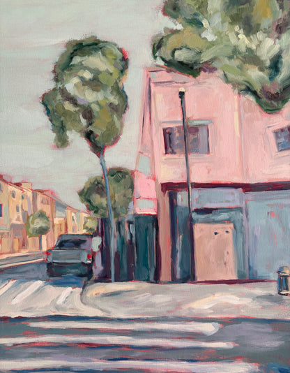 Close up of a painting of a street scene with buildings, trees, and a car.